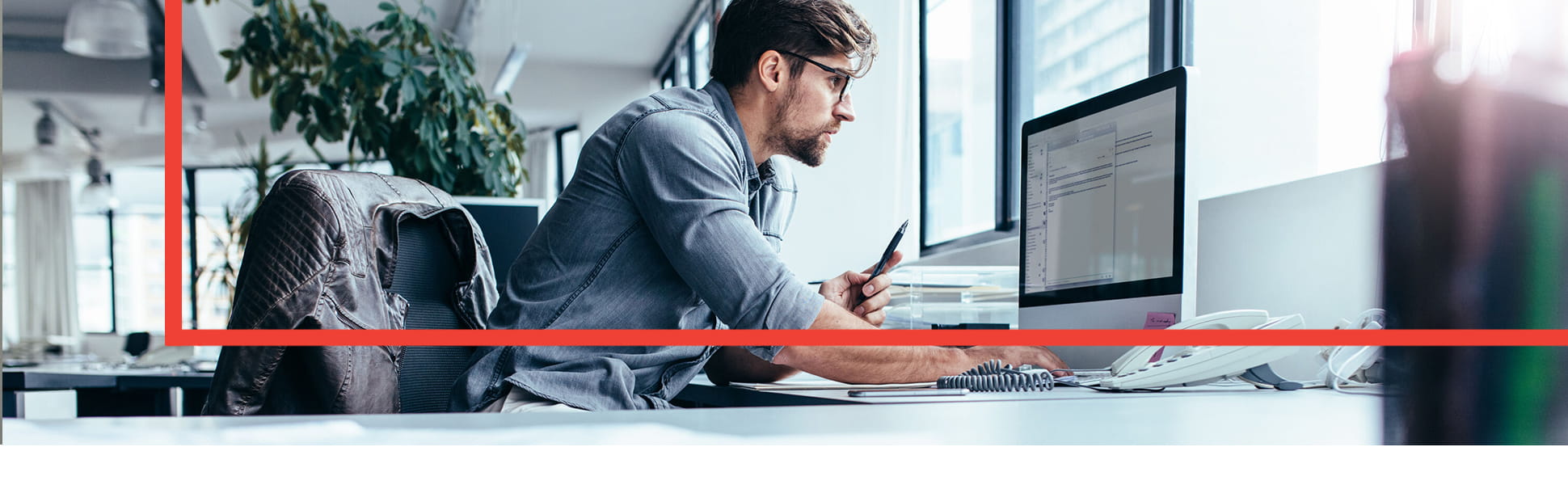 Man working on his desktop computer