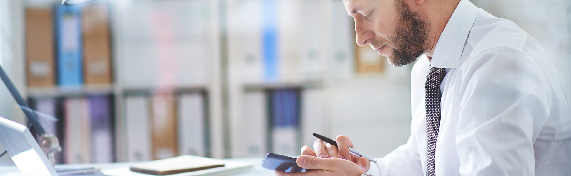 Man looking at mobile phone